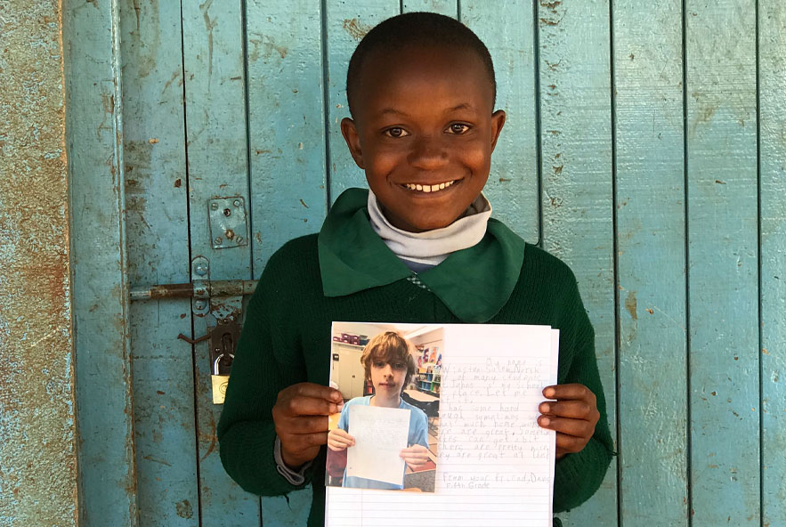 PenPal Program Child and Letter