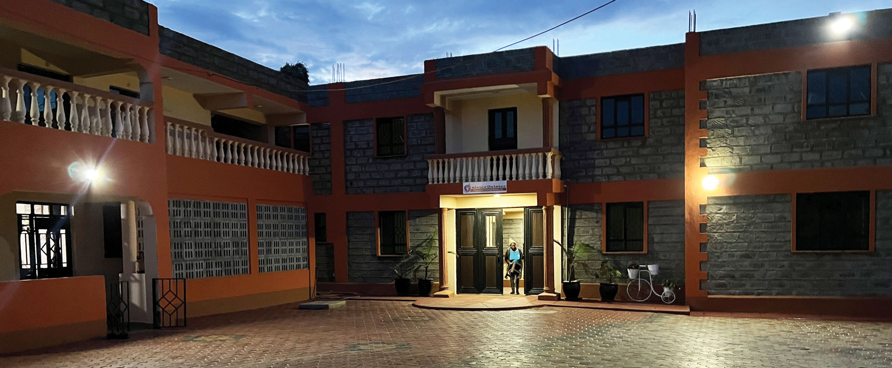 Sister2Sister Children's Home & School Construction at Night